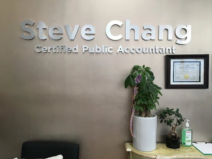 Reception wall with the sign 'Steve Chang, Certified Public Accountant' and a framed certificate